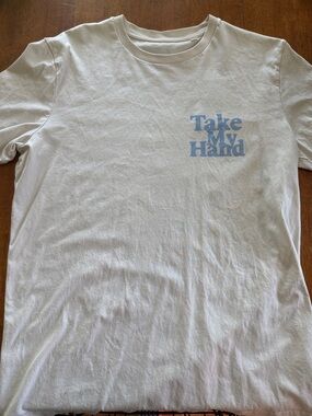 White Graphic Tee with 'Take My Hand' Blue Text